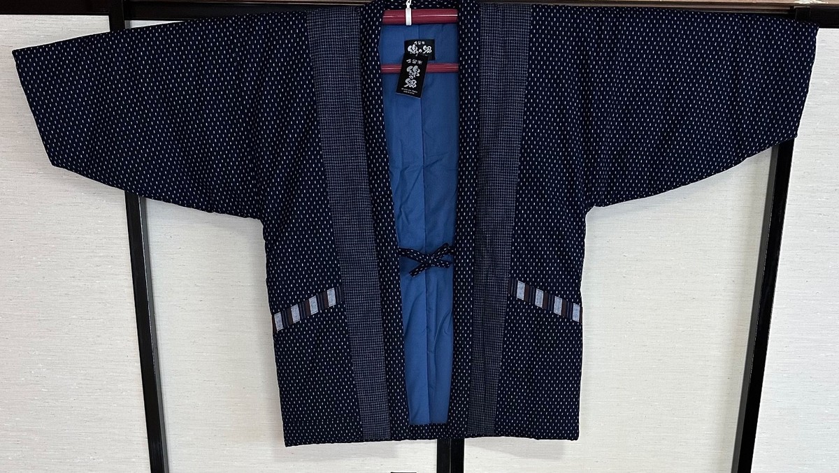 Quilted cotton hanten jacket in an indigo kasuri woven pattern