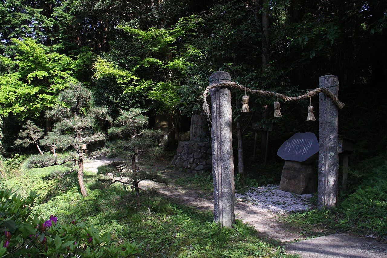 Stone pillars joined by a straw rope marking Yomotsu Hirasaka, the traditional entrance to Yomi