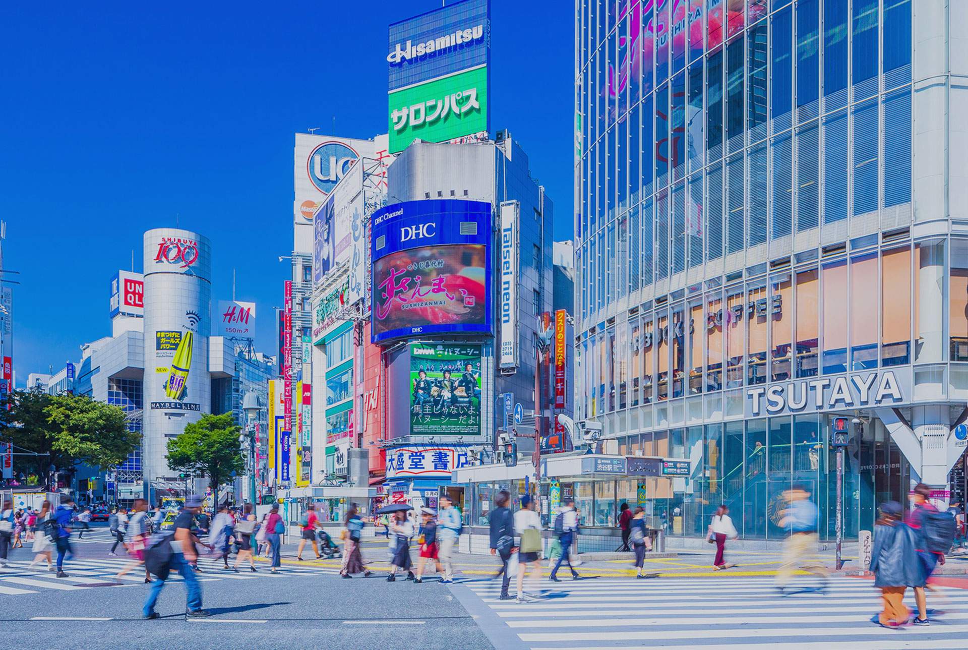 Shibuya shopping district in Tokyo lined with fashion storefronts