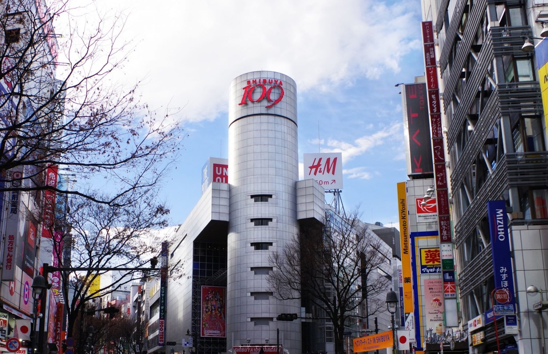The Shibuya 109 building in Tokyo with its red 109 logo above the street