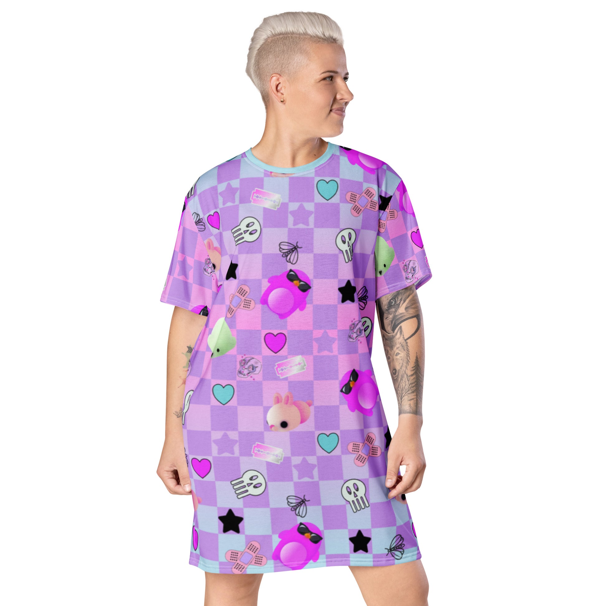 Pastel purple and pink checkerboard t-shirt dress printed with bandages, razor blades, skulls and hearts