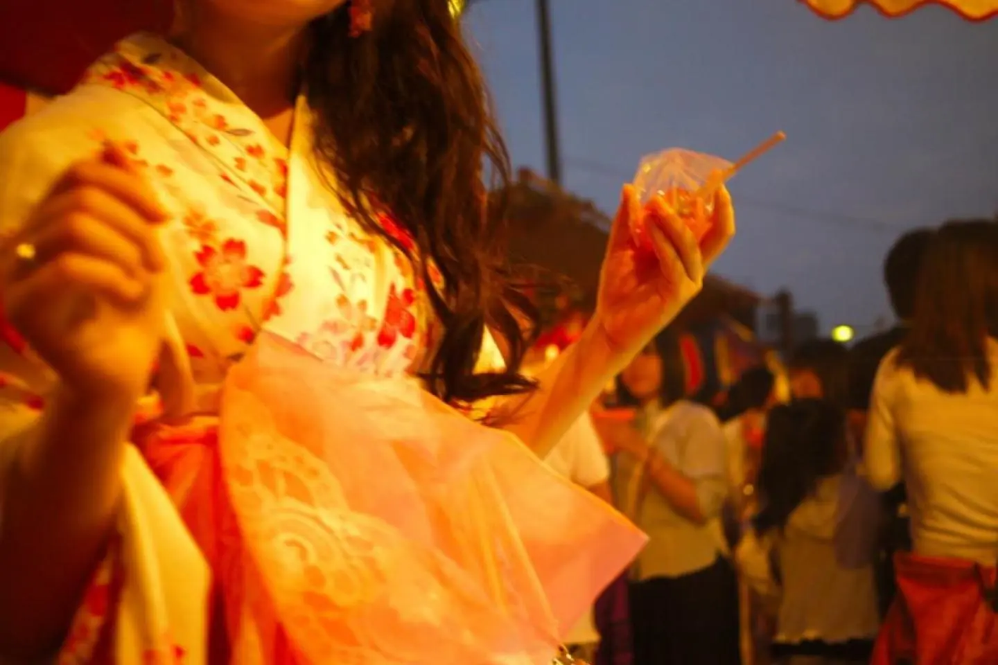 Group wearing colorful yukata at a Japanese summer festival