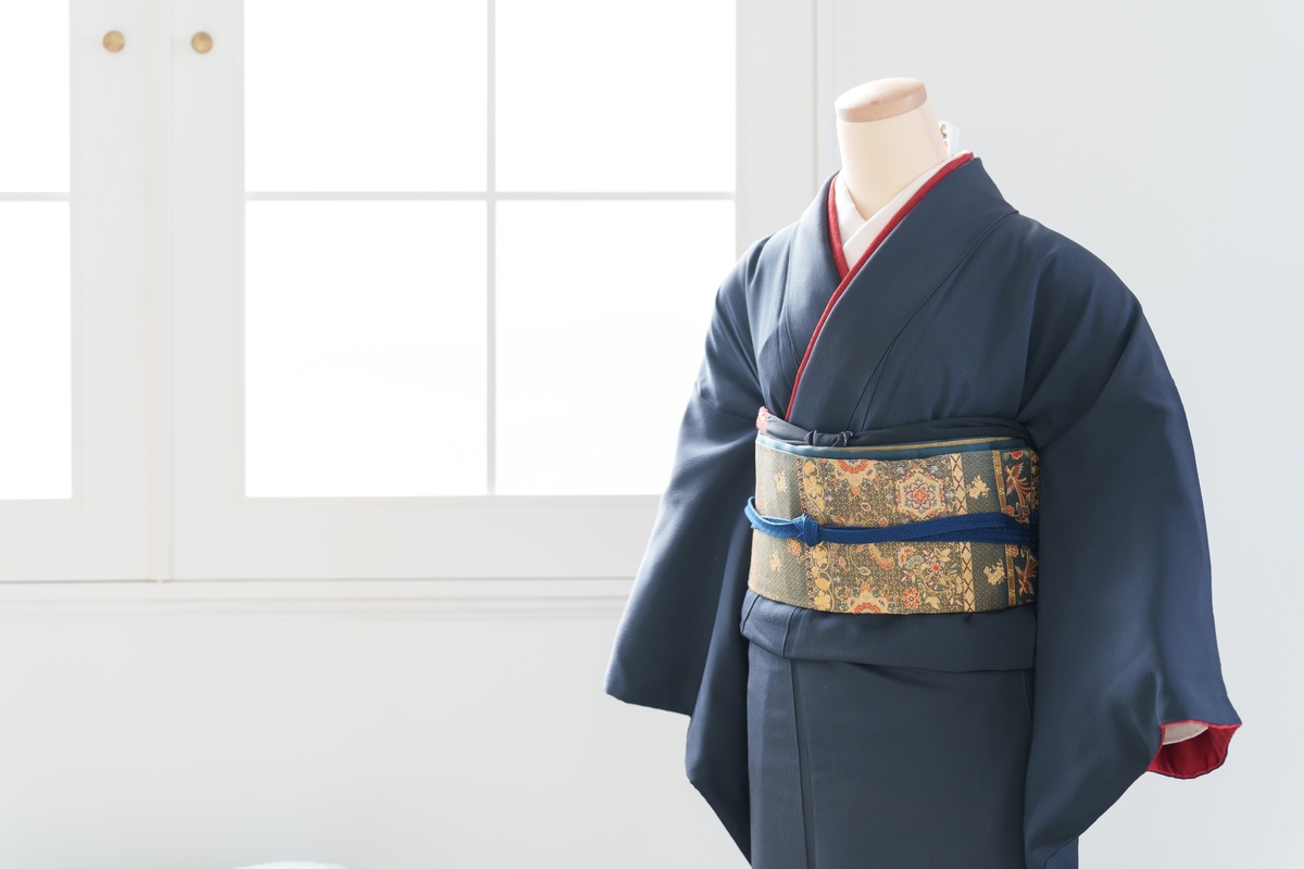 Woman wearing a formal silk kimono with an elaborate obi