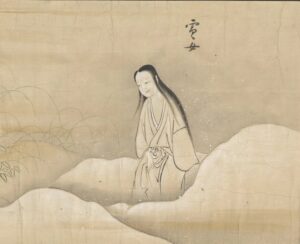 Edo period Japanese scroll painting of Yuki Onna, a pale woman in a white robe standing on a snowy hillside
